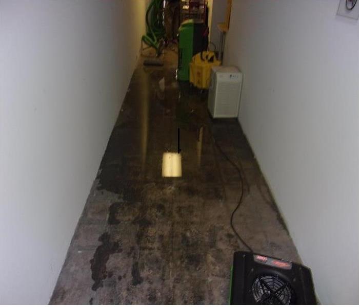 Flooded commercial hallway
