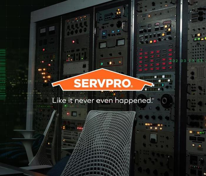 Servpro logo over technical background